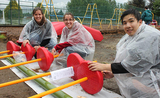 Volunteers from Circle K International built playgrounds at two Vancouver Schools