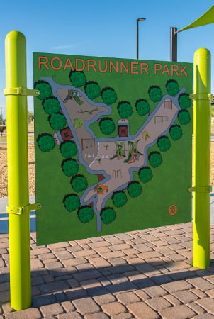 A sign reading "RoadRunner Park" with a map of the park. 