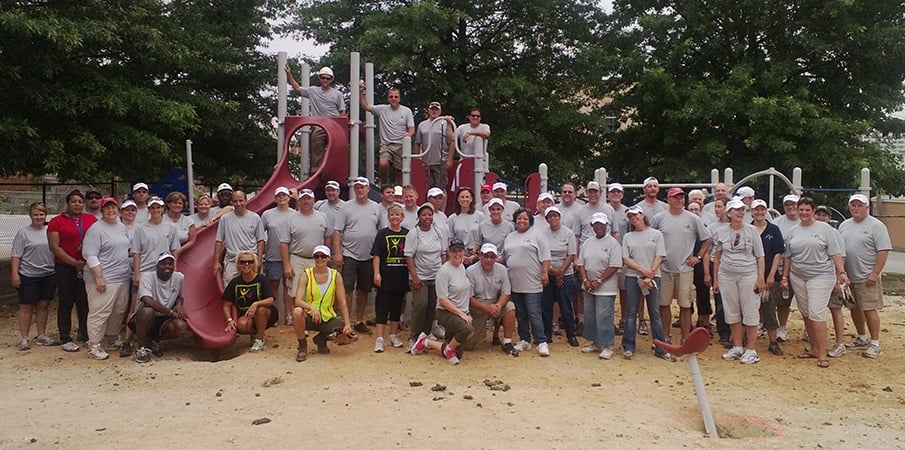 Volunteers building a playground.