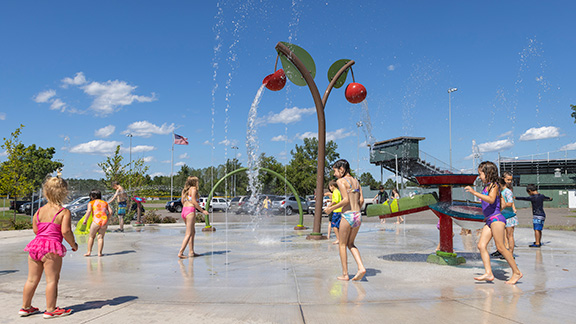 Kids playing at a splash park